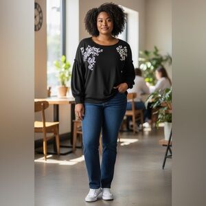 Elegant Black Sweatshirt with White Floral Accents